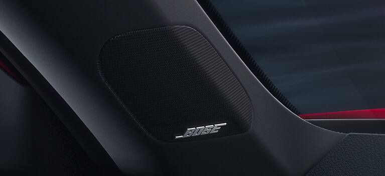 2026 Honda Civic Hatchback Sport Touring Hybrid detail of the Bose premium sound system speakers (Compact Hatchback).