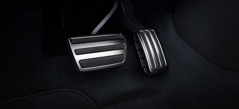 2026 Honda Civic Hatchback close up of the sport pedals with metallic finish (Compact Hatchback).