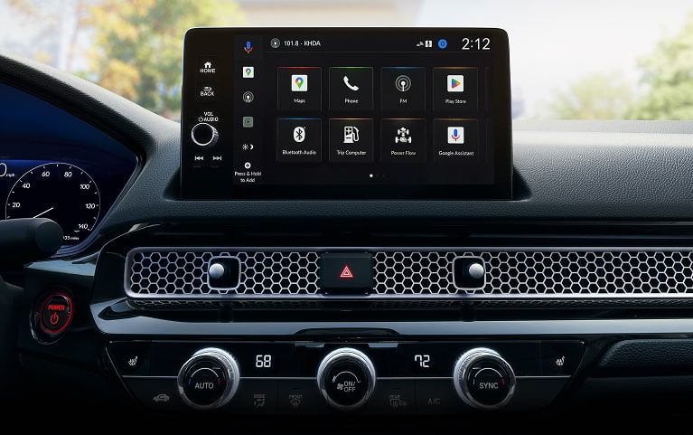 2026 Honda Civic Hatchback Sport Touring Hybrid dashboard with screen displaying Apple CarPlay (Compact Hatchback). 2026 Honda Civic Hatchback Sport Touring Hybrid dashboard with screen displaying Apple CarPlay (Compact Hatchback).