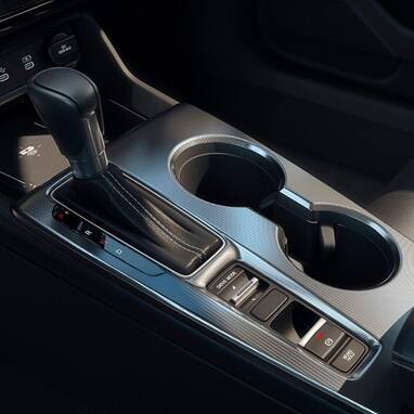 2026 Honda Civic Hatchback Sport Touring Hybrid center console with gear shift and cup holders (Compact Hatchback).